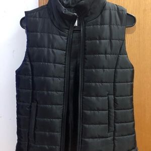 Black puffy vest